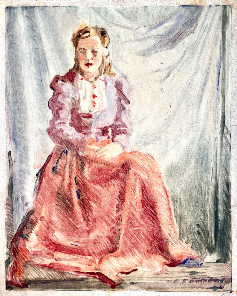 "Istuv naine rahvariides"